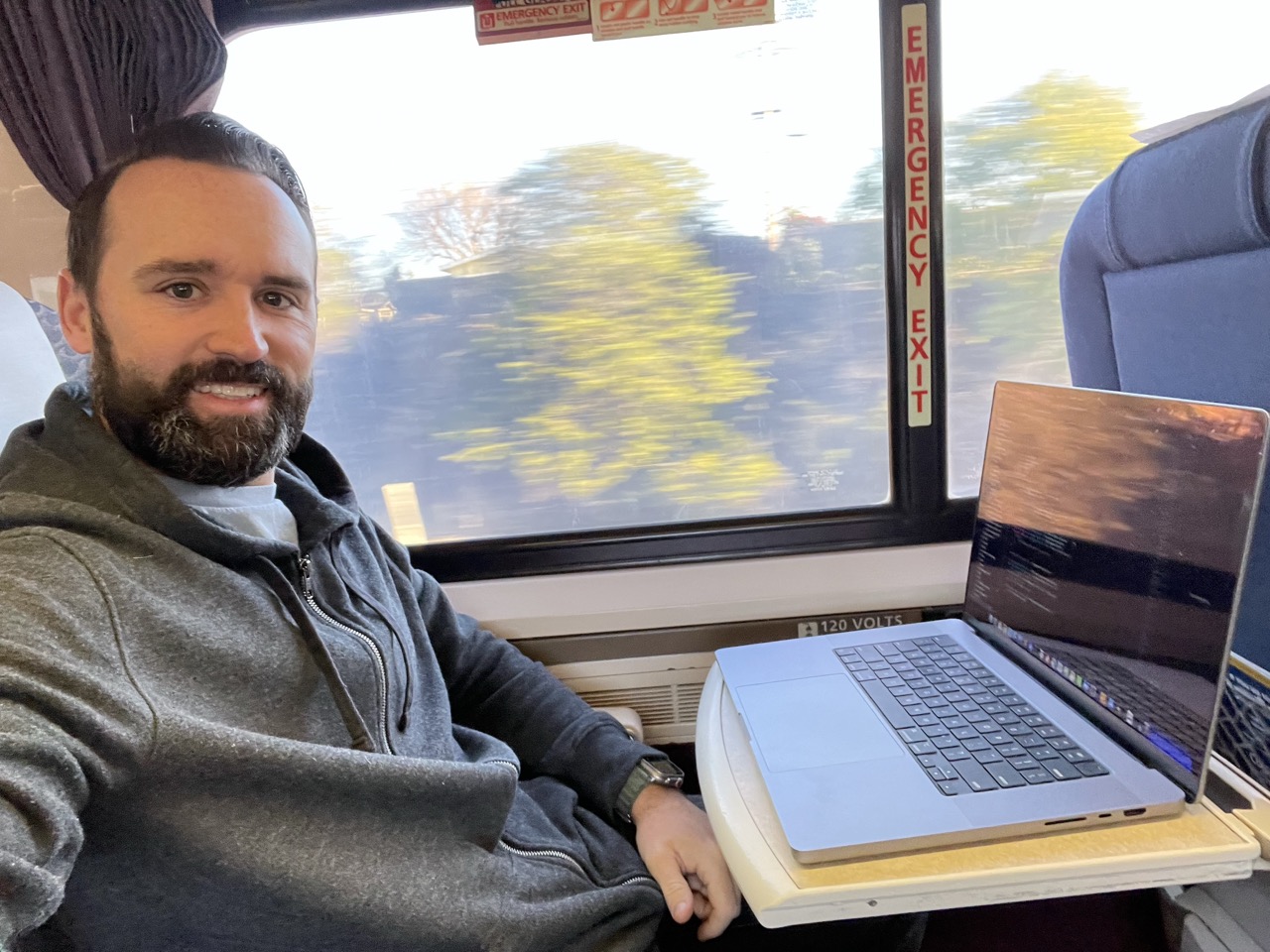 Bryan programming on the train to work